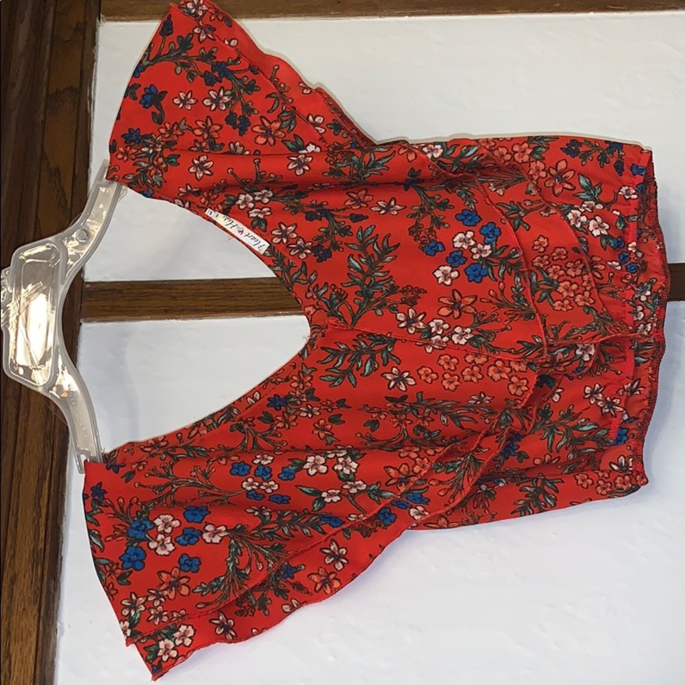 A crop top red with flowers